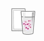 Verre et sachet de Femannose®PLUS, conseils d'utilisation
